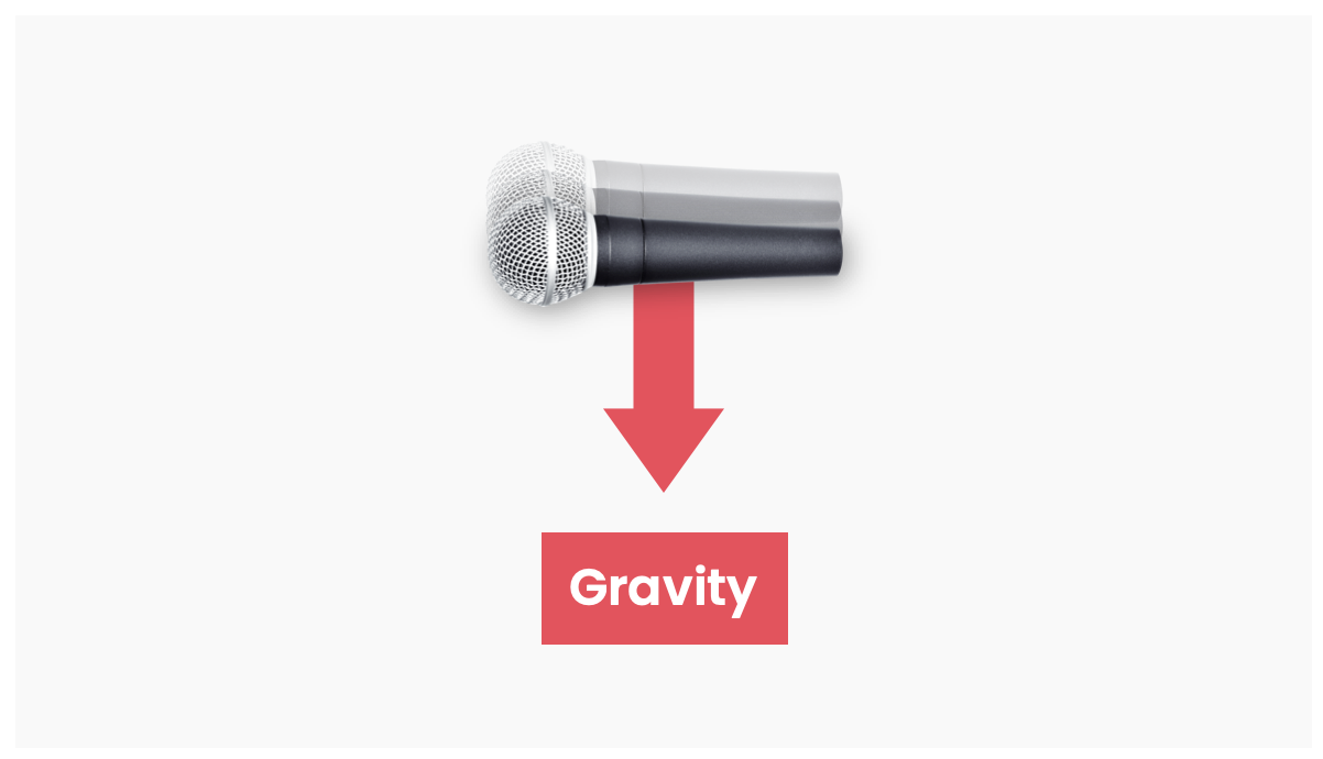 The force of gravity pulling a microphone towards the ground